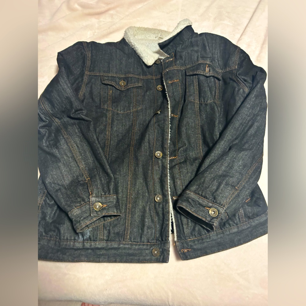 Black Denim jacket with a faux fur on the inside.